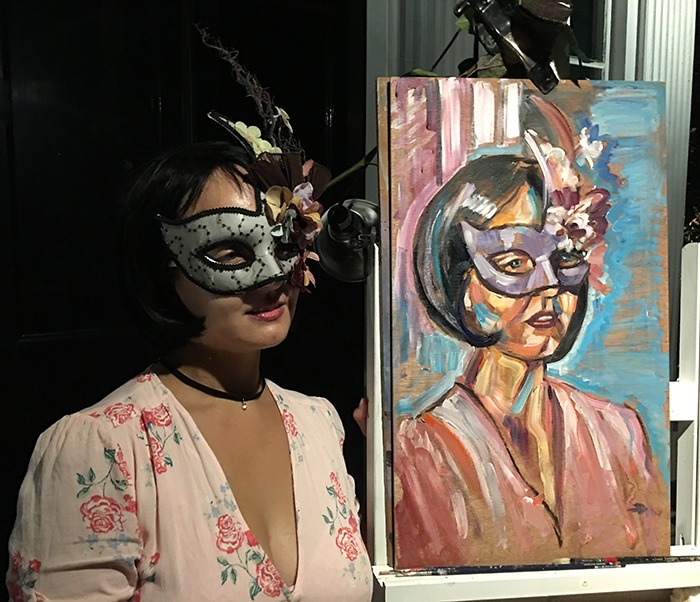 Rupert Nesbitt doing a live painting portrait of a young woman at an event called the "Anti Gala"