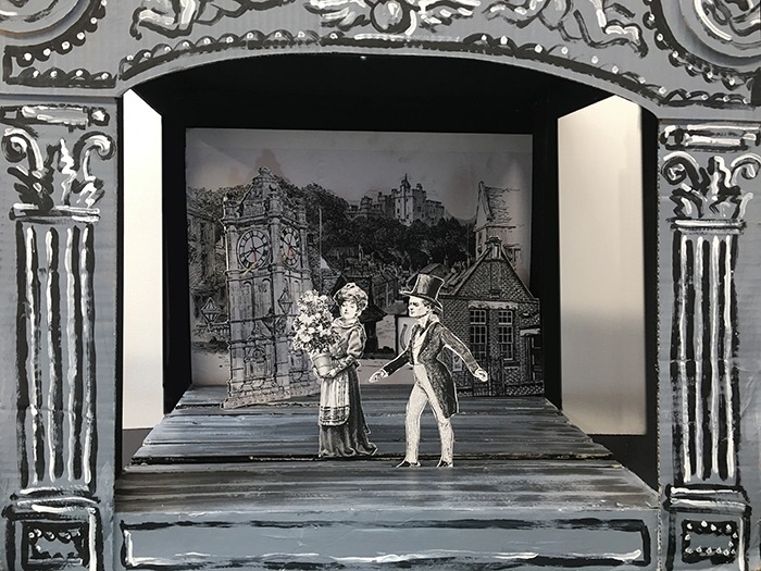 This is an image of a paper theatre in an intimate and in-person setting